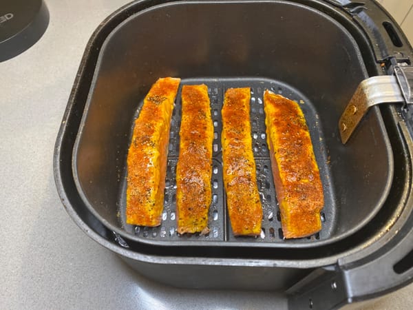 Place 2 to 4 filets in the air fryer, ensuring space between them for even cooking.