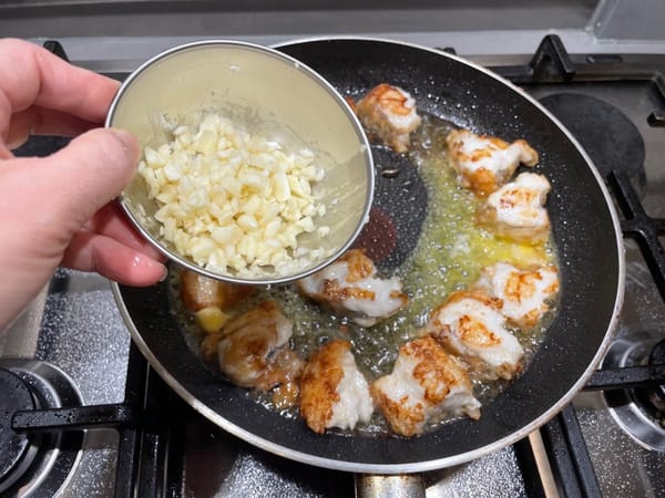 Then add the minced garlic and stir-fry.