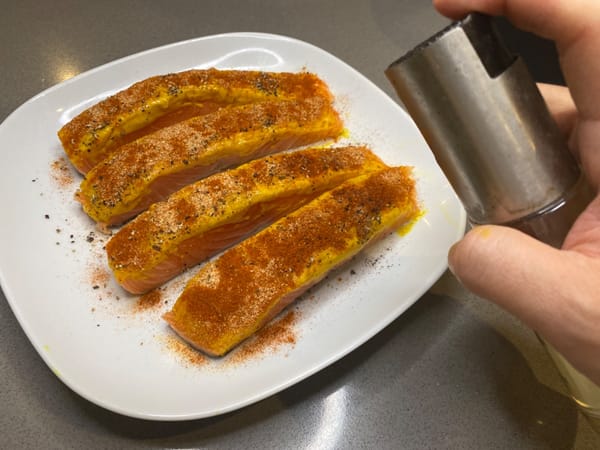 Lightly spray each filet with olive oil to keep it moist.