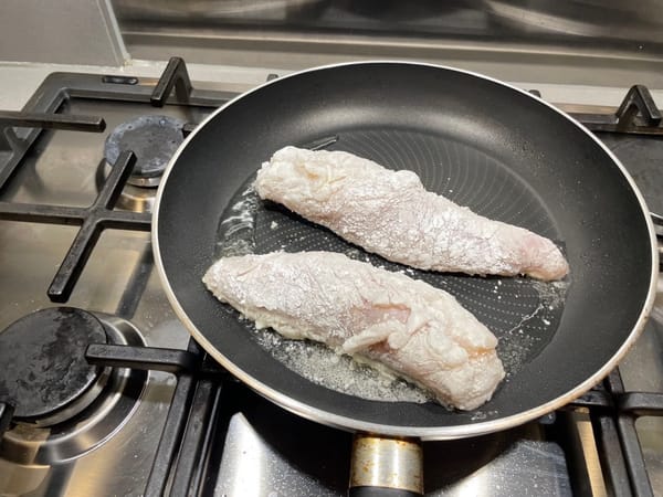 Heat oil in a hot wok and fry the monkfish.