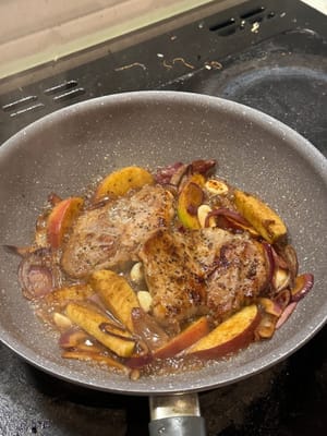 Add the pork shoulder back in the pan, and let simmer for 15 minutes with medium low heat