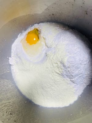 Put all the ingredients except butter, salt and pineapple filling into a bowl and knead until it becomes 80% filmy.