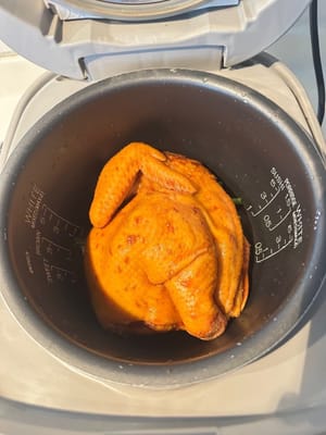 Put the marinate chicken on top and start the cooker to quick cooking mode