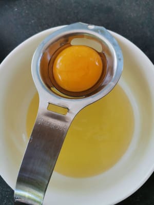 break the eggs, then separate the whites and yolks