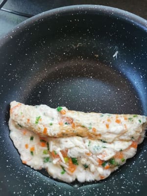 then after it is half cooked, roll it from the front to the back