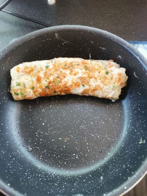 then roll the eggs to the end of the Teflon, then add a little more oil