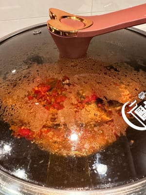 Tutup dengan penutup dan masak dengan api sedang selama 5 menit.