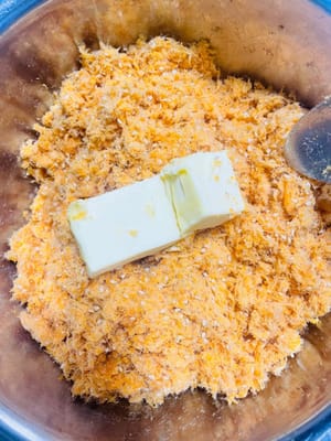 Add 40g of butter melted at room temperature and mix well. This will make the meat floss sticky and can be rolled into a ball.