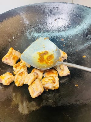 Pour cooking wine along the side of the pot for flavor. Add one tablespoon of oyster sauce and one tablespoon of dark soy sauce for flavor and color. (No need to add extra salt since the preserved plums are salty.)