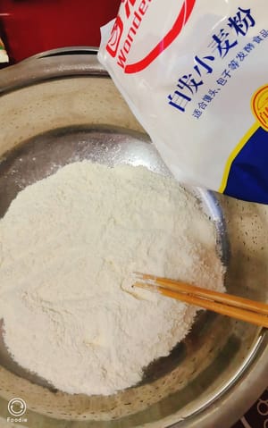 250g de harina leudante.
