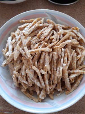 Cut the tempeh into thin, lengthwise slices.