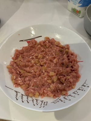 Transfer the patty onto a flat plate evenly for steaming