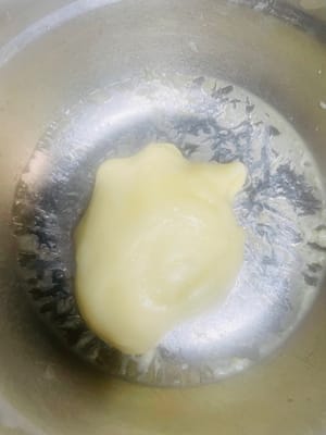 After removing from the heat, add butter and smooth cream cheese, and knead until fully combined.