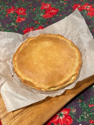 完成後，塗上一層融化的無鹽奶油，再撒上切碎的歐芹，就完成了！