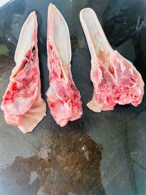 Chop the duck head into pieces (be careful when chopping). I am a bit stingy 😂, so I chopped it three times. You can also ask the duck vendor to do the processing for you.