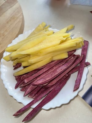 Start by cutting the potatoes into strips after peeling the skin
