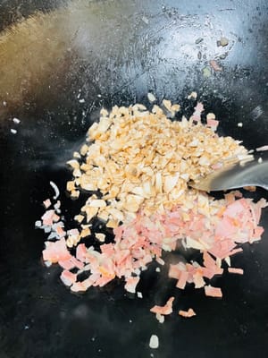 Add shiitake mushrooms and stir-fry until soft and water releases.