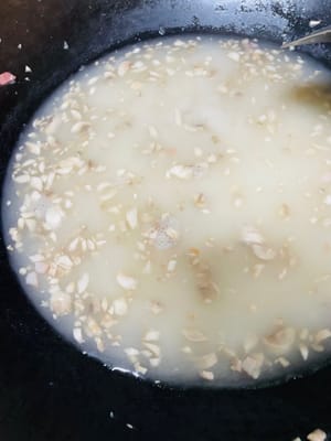 Add flour water, bring to a boil, add black pepper and salt to taste (bacon is salty, so use less salt). Stir carefully to avoid sticking to the bottom and burning it.