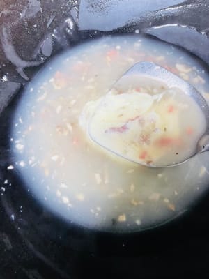 Add light cream and bring to boil.