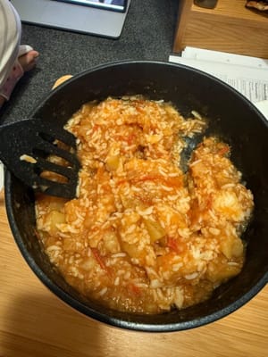 Add rice and stir well.