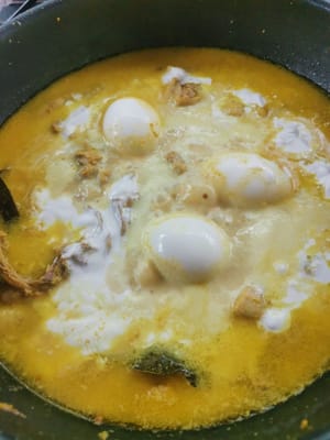 puis ajouter le lait de coco et remuer