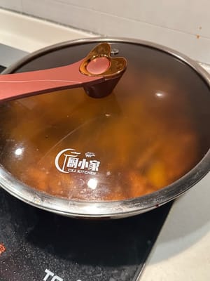 Add in around 150 mL boiling water. Close the lid and let simmer in medium heat for 10 minutes