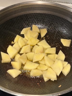In the same pan, sear the potato slightly. Reserve as well