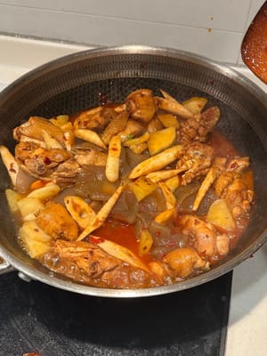 Add in around 150 mL boiling water. Close the lid and let simmer in medium heat for 10 minutes