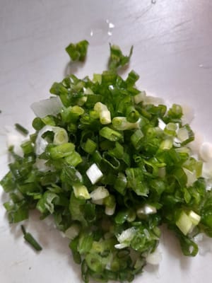 Finely chopped spring onions