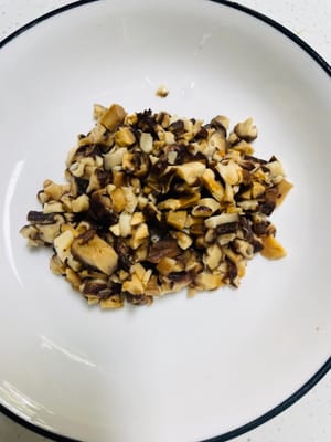 Chop the soaked mushrooms into small pieces and set aside.