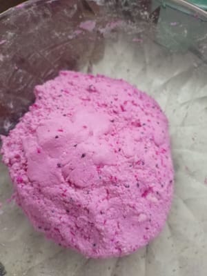 Roll the dough into strips and then shape into small balls.