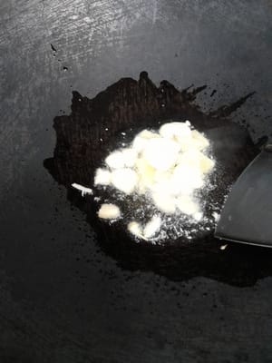 Prepare a frying pan, saute the spices until fragrant.
