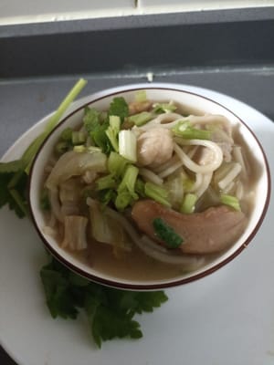 Fresh noodles soup with pork and cabbage