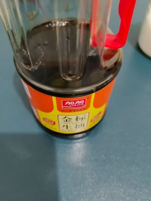 Satu sendok makan kecap asin encer