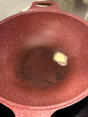 In the same pan, add a scoop of butter, and fry the corns slightly. Reserve