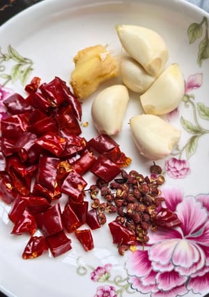 One clove of garlic and one small ginger sprout