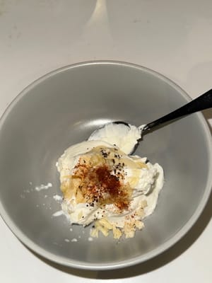 Prepare yogurt sauce by mixing Greek yoghurt, chilli powder, remaining minced garlic, lemon juice, honey, salt and pepper