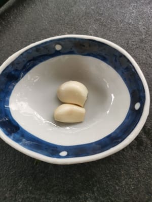 finely grated garlic cloves
