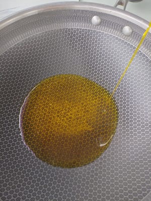Heat oil in a pan.