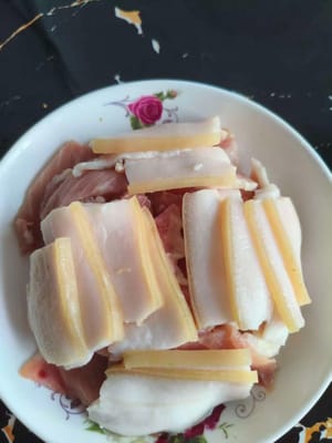 Cut the pork belly into thin slices and set aside.