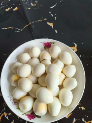 Peel the quail eggs and set aside.