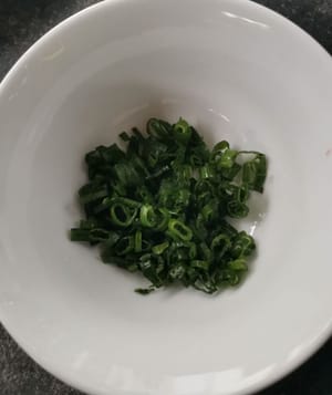 then cut the spring onions into small pieces