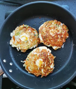 Then turn the fritters over and fry until golden brown.