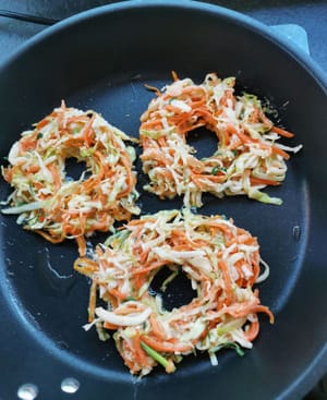 then make a hole in the middle of the fritter using chopsticks