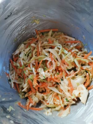 Then stir and add the sliced spring onions, and stir.