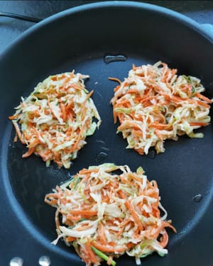 then put the fritter mixture into the pan, shape into balls, fry over low heat