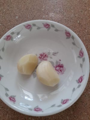 Knoblauch, in Scheiben geschnitten