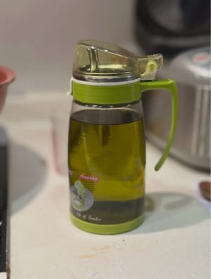 circa 30 g di olio caldo