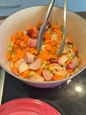 In the same pan, add in onion, celery and carrots first. Stir fry until they are slightly softened