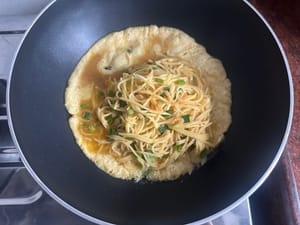 Versez les pommes de terre râpées mélangées